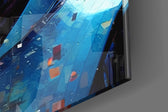 Sci-fi-enforcer artwork anchoring a wall with cobalt-and-scarlet palette