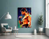 Fighter glass wall art styled above a sideboard in a media room