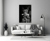 Gun Dog glass wall art styled above a console in a study