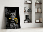 Dark-guard artwork anchoring a wall with gold-and-charcoal palette