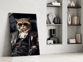 Feline-don artwork anchoring a wall with onyx-and-gold palette