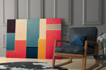 Color-field artwork anchoring a wall with coral-and-teal palette