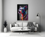Dog Vogue glass wall art styled above a console in a media room