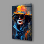 Hat close-up showing tangerine fedora and cobalt scarf