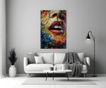 Lips and Flowers glass wall art styled above a console in a boutique