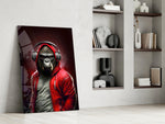 Hooded-ape artwork anchoring a wall with scarlet-and-charcoal palette