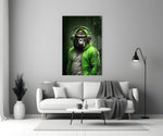 Animal Vogue glass wall art styled above a sideboard in a media room