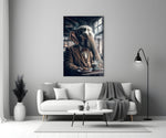 Retired Elephant glass wall art styled above a console in a sunroom