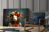 Flower-crowned artwork anchoring a wall with scarlet-and-teal palette