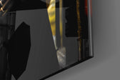Java the Leopard panel catching lamp light to reveal its cinematic glow