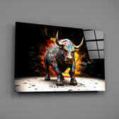 Bull close-up showing charging stance and scarlet-gold splatter