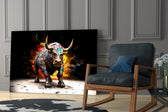 Charging-beast artwork anchoring a wall with scarlet-and-gold palette