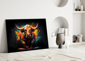 Bull glass wall art styled above a console in a media room