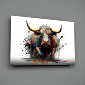 Bull close-up showing forward stance and magenta splatter