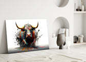 Bull glass wall art styled above a console in a media room