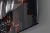Sci-fi-villain artwork anchoring a wall with chrome-and-amber palette