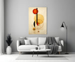 Circles glass wall art styled above a console in a foyer