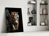 Stalking-predator artwork anchoring a wall with amber-and-onyx palette