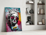 Marble-pop artwork anchoring a wall with teal-and-magenta palette
