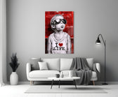 I Love Life glass wall art styled above a console in a media room