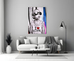 I Love Life glass wall art styled above a console in a media room