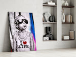 Stencil-boy artwork anchoring a wall with scarlet-and-cobalt palette