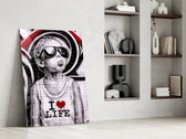 Stencil-boy artwork anchoring a wall with scarlet-and-monochrome palette