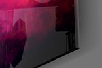 Cross panel catching lamp light to reveal its cinematic glow