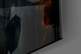 Cross panel catching lamp light to reveal its cinematic glow