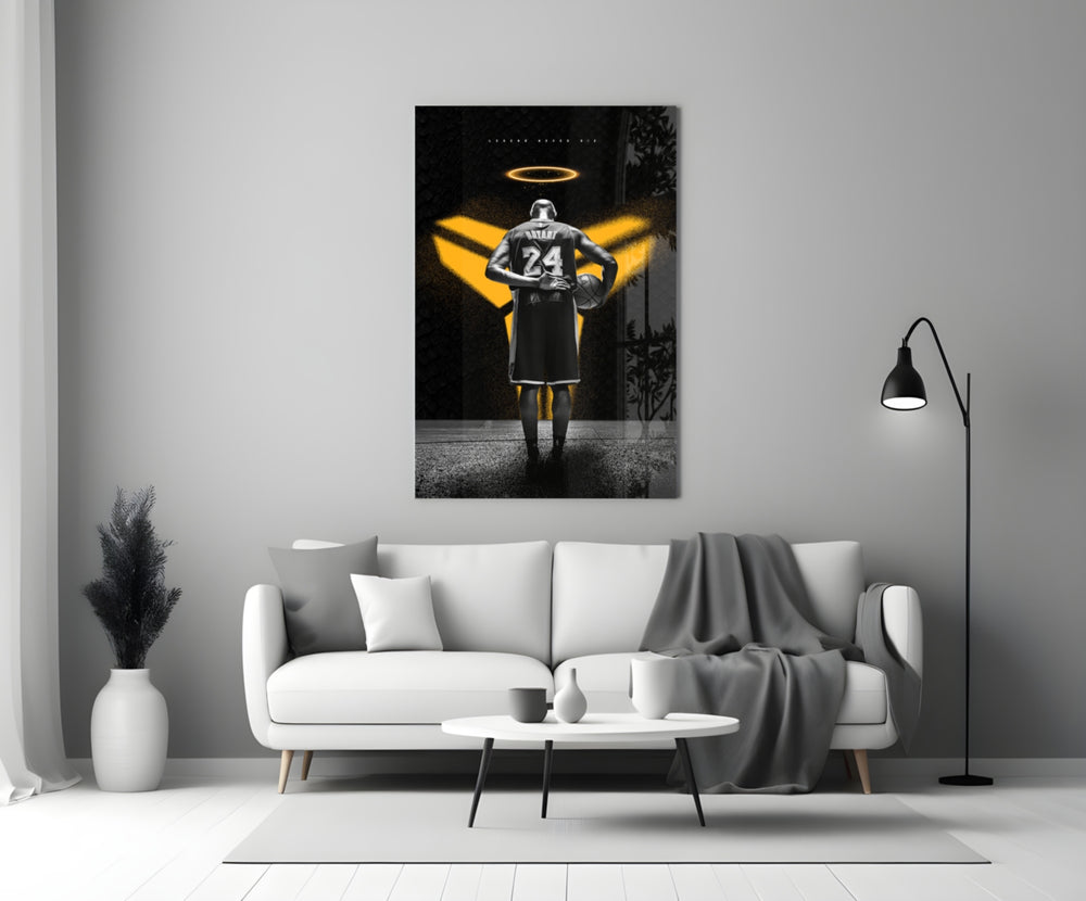 Kobe Bryant glass wall art styled above a console in a media room