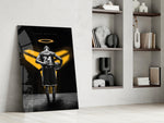 Basketball-legend artwork anchoring a wall with gold-and-onyx palette
