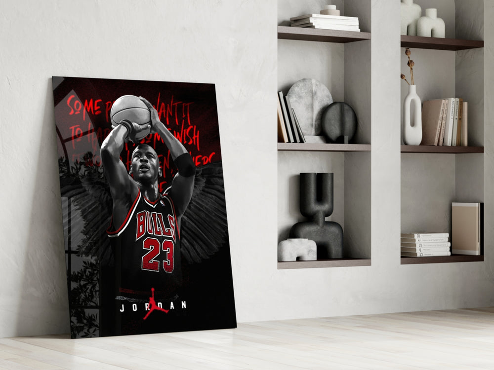 Basketball-legend artwork anchoring a wall with scarlet-and-monochrome palette