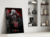 Basketball-legend artwork anchoring a wall with scarlet-and-monochrome palette
