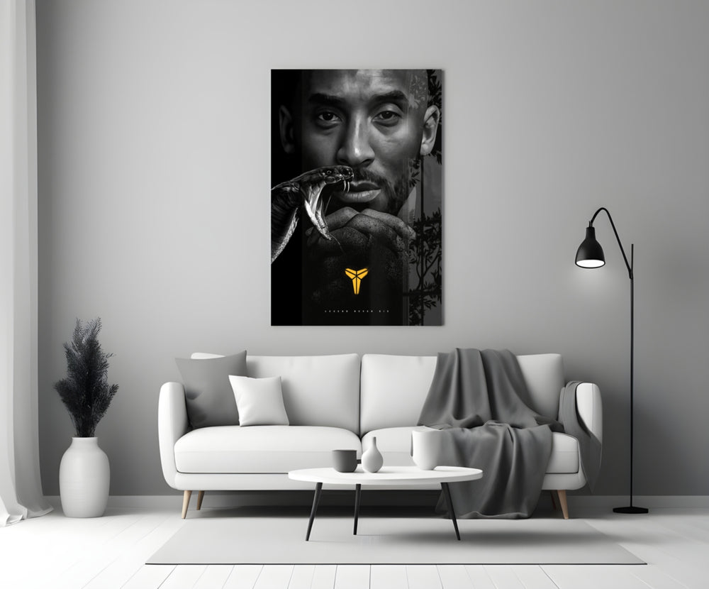 Kobe Bryant glass wall art styled above a console in a media room