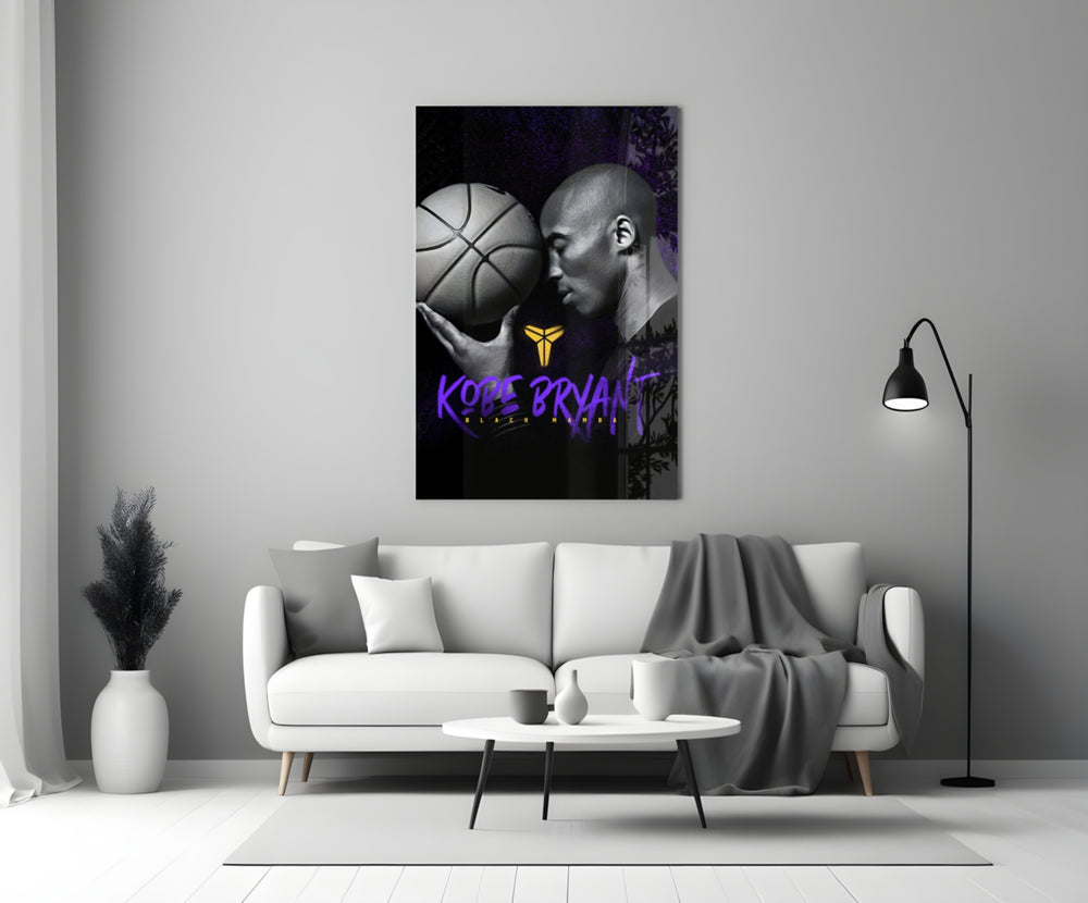 Kobe Bryant glass wall art styled above a console in a home gym