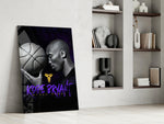 Basketball-legend artwork anchoring a wall with violet-and-monochrome palette