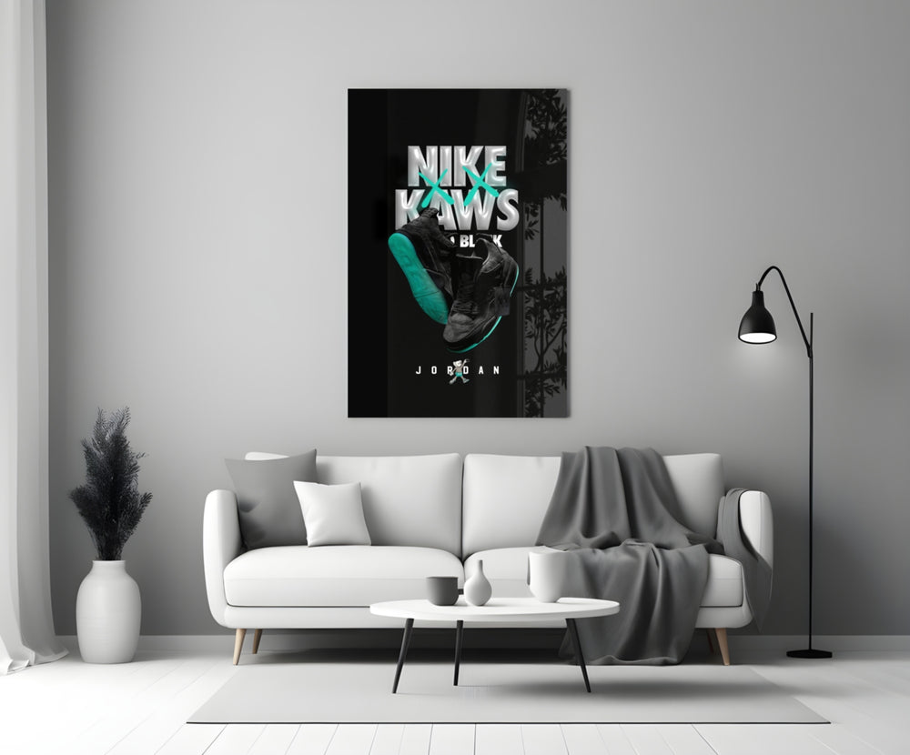 Black Kaws glass wall art styled above a sideboard in a media room