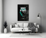 Black Kaws glass wall art styled above a sideboard in a media room