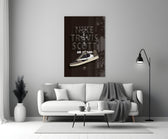 Air Jordan glass wall art styled above a console in a media room
