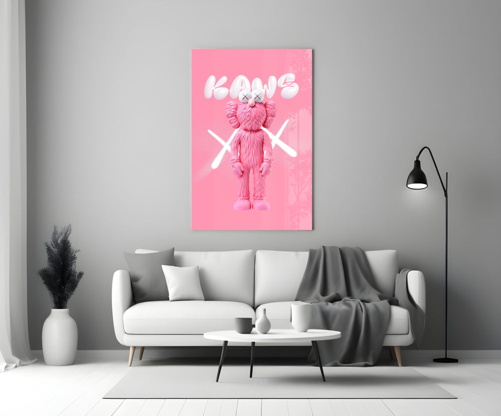 Kaws glass wall art styled above a console in a powder room
