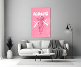 Kaws glass wall art styled above a console in a powder room
