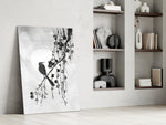 Sumi-e-bird artwork anchoring a wall with monochrome palette