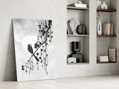 Sumi-e-bird artwork anchoring a wall with monochrome palette