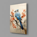 Bird on the Branch close-up showing blue jay and coral cherry blossoms