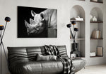 Rhino glass wall art styled above a sofa in a sentinel-mood living room