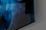Blue Smoke artwork anchoring a hallway with cool palette
