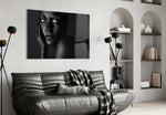 Woman Portrait 37 glass wall art styled above a bed in an introspective bedroom
