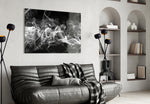White Smoke glass wall art styled above a bed in a serene bedroom