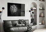 Tiger glass wall art styled above a sofa in a statement living room