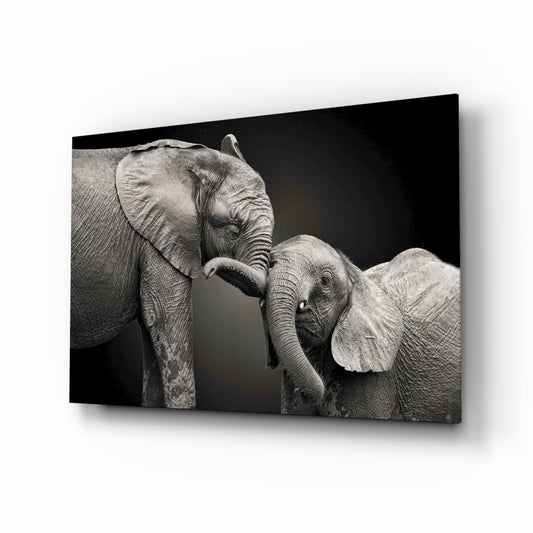 Elephants glass wall art displayed above a console in a designer interior